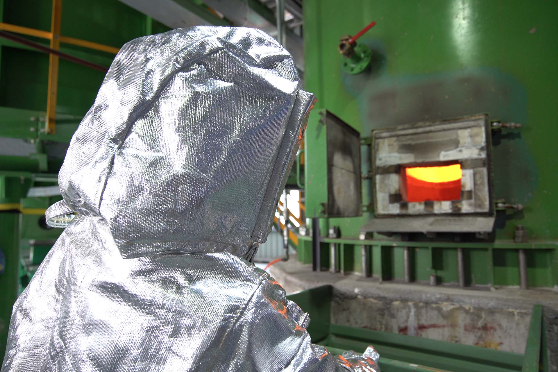 Suzhou Tianma Specialty Chemicals Co plant worker on hearth furnace